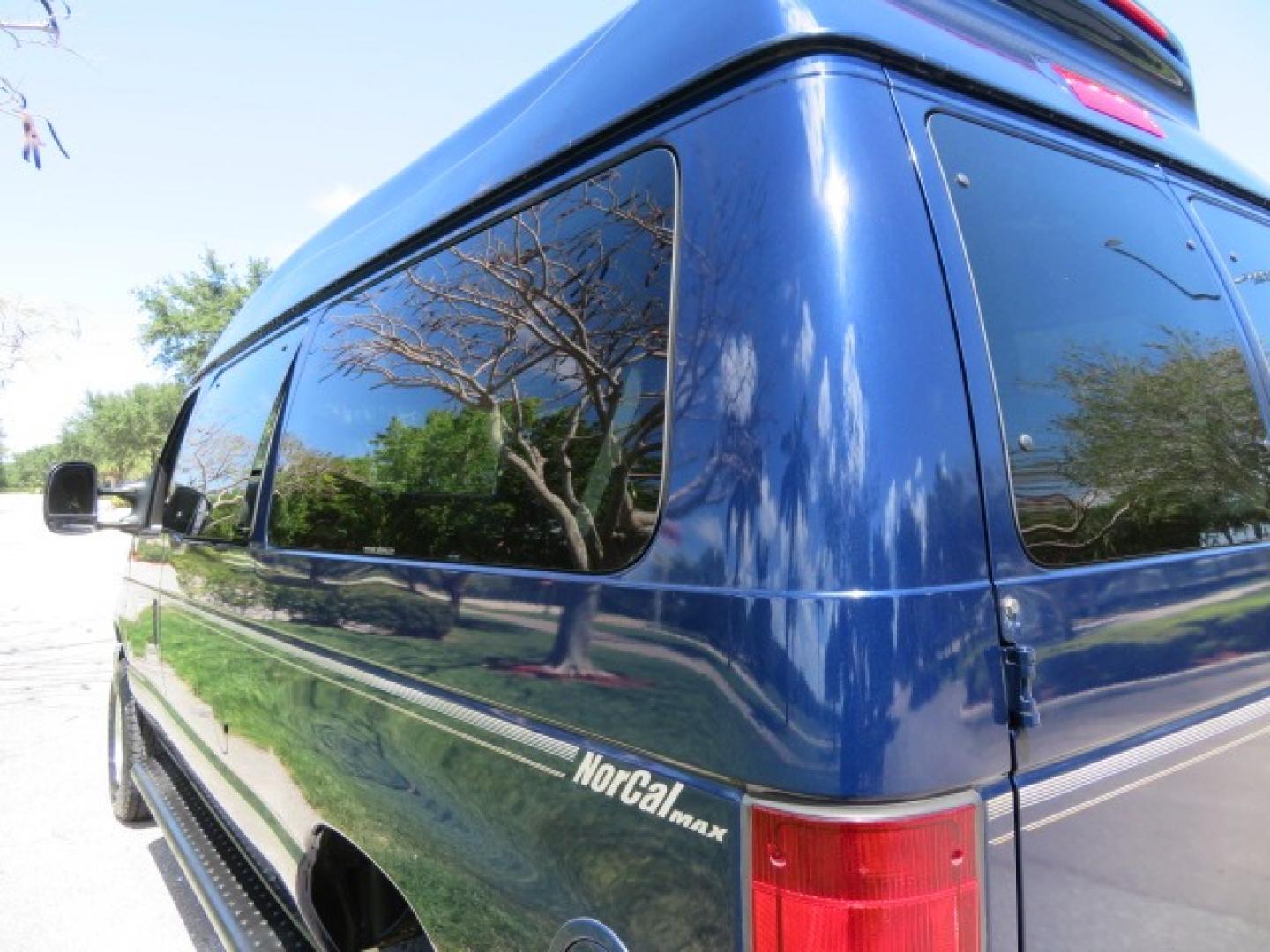 2011 Dark Blue /Gray Ford E-Series Wagon E-350 XLT Super Duty (1FBNE3BS4BD) with an 6.8L V10 SOHC 20V engine, located at 4301 Oak Circle #19, Boca Raton, FL, 33431, (954) 561-2499, 26.388861, -80.084038 - You are looking at a Gorgeous 2011 Ford Econoline E350 XLT Norcal Max High Top Handicap Wheelchair Conversion Van with 6.8L V10, 15K Original Miles, 9 Inch Lowered Floor, Braun UVL Side Entry Wheelchair Lift, Remote Control Power Side Entry Doors, Expanded Side Entry Doors, Q Straint Tie Down, Syste - Photo#34